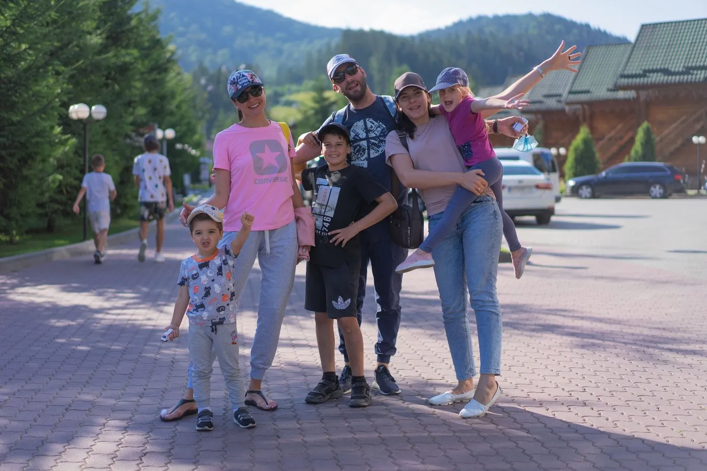 A family of travelers smiling during their trip