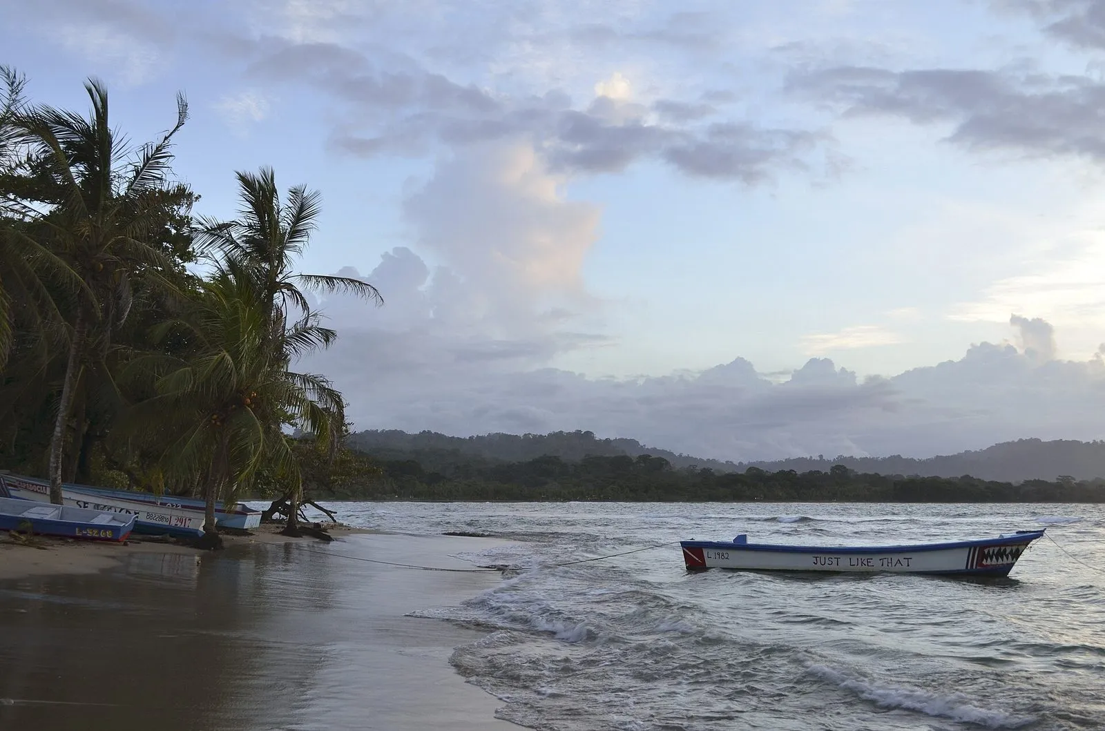 Fishing boats on the beach at Puerto Viejo de Talamanca at dusk